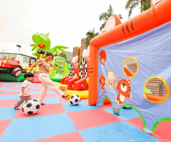 Brightly colored inflatable games and challenges at Jumptopia